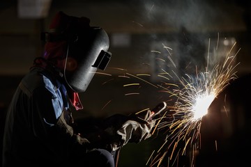 Welder fabrication steel structure with shielded metal arc welding