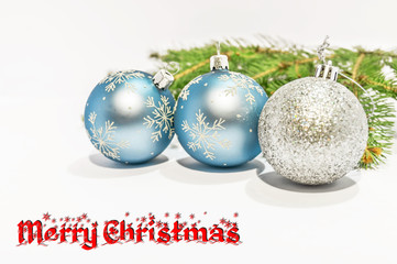 Merry Christmas and decorative ball on the white background