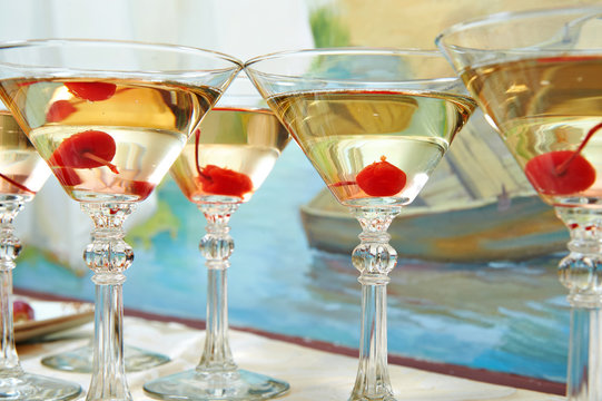 Martini glasses and cherries on holiday party