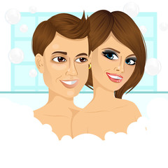 young happy couple enjoying relaxing bubble bath 