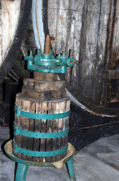 image of old wine press in a vinery