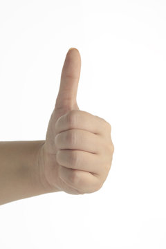 Female Hand with Thumbs up Gesture