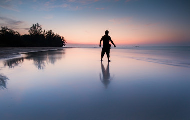 lonely man on the beach