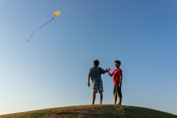 Running with kite silhouette