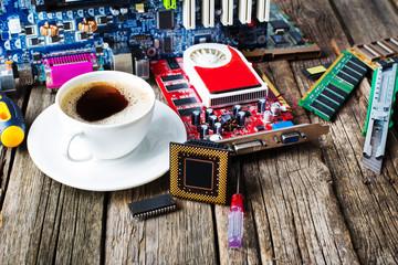 Coffee break. Competur specialists table with pc parts