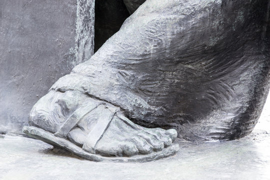 Bronze feet of a statue