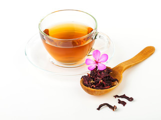 Glass Cup Tea with camomile flower and Mint Leaf, on white
