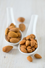 almonds on wooden surface