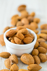 almonds on wooden surface