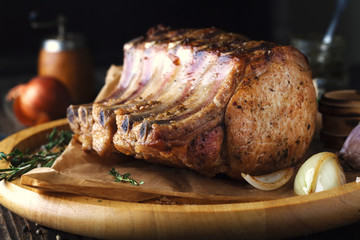 Grilled pork chop with spices, garlic and onions