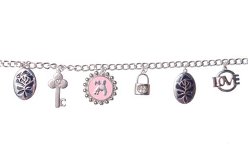 silver bracelet with pendants on a white background