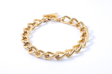 thick gold bracelet isolated on white