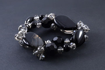 bracelet of precious stones isolated on black