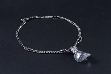 Fototapeta na wymiar silver bracelet with big stone isolated black