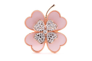 brooch in the form of clover on a white background