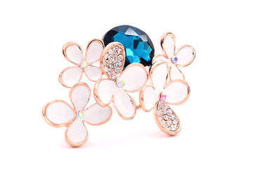 brooch in the shape of flowers on a white background