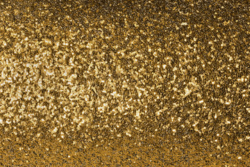 shiny  gold  background with sparkles closeup