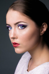 Fototapeta premium Nice model with color make-up and red lips