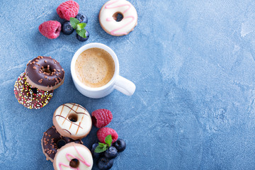Small mini donuts with fresh berries