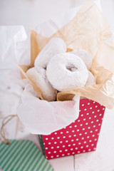 Obraz na płótnie Canvas Food gift in a colorful box mini donuts