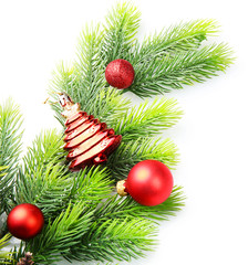 Christmas tree branch with red berries and decorations on white background