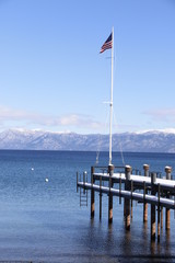Travel: Lake Tahoe - beach with snow and flag