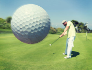 Man playing golf at club
