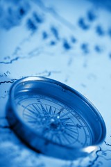 Close up view of the compass on the old map © lotus_studio