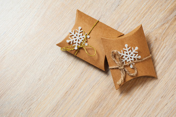 Gift box with ribbon bow and snowflake