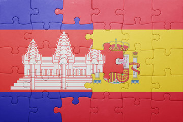 puzzle with the national flag of spain and cambodia