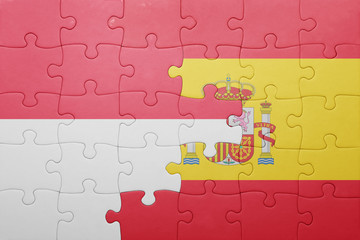 puzzle with the national flag of spain and indonesia