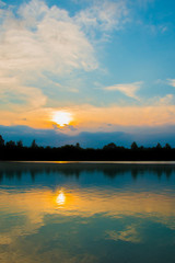 Fototapeta na wymiar Quiet sunset at a small lake