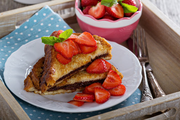 French toasts with chocolate spread and strawberry