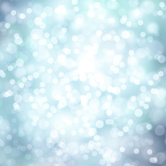 Bright winter shiny cyan color abstract bokeh circle shape copy space background with sparkle. Lovely abstract winter season bokeh copy space illustration background.