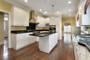 Kitchen with white cabinetry