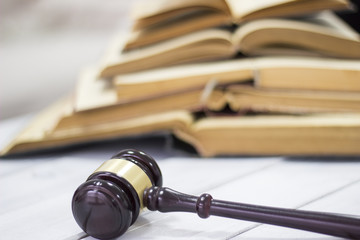 Law concept, gavel and books on wooden