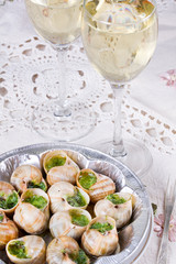 White wine and grape snails