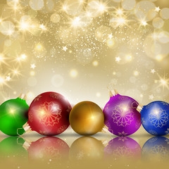 Multi-colored Christmas balls on a gold background