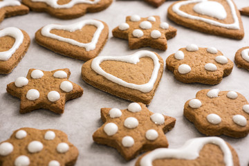 Christmas traditional gingerbread homemade cookies with white frosting
