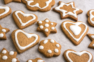Christmas traditional gingerbread homemade cookies with white frosting