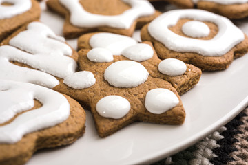 Christmas traditional gingerbread homemade cookies with white frosting