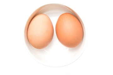 two eggs in a white bowl