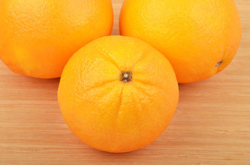 Orange on wooden background