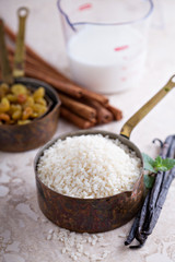 Raw rice in a measuring cup ready to be cooked