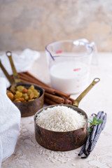 Raw rice in a measuring cup ready to be cooked