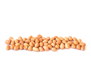 Close up raw peanuts on white
