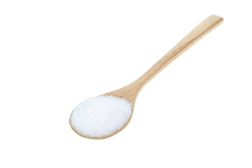 Close up of white sugar in wooden spoon isolated on white