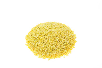Macro .peeled split mung bean isolated on white