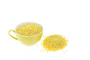 Close up peeled split mung bean in cup