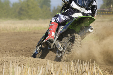 motocross racer accelerating speed in track